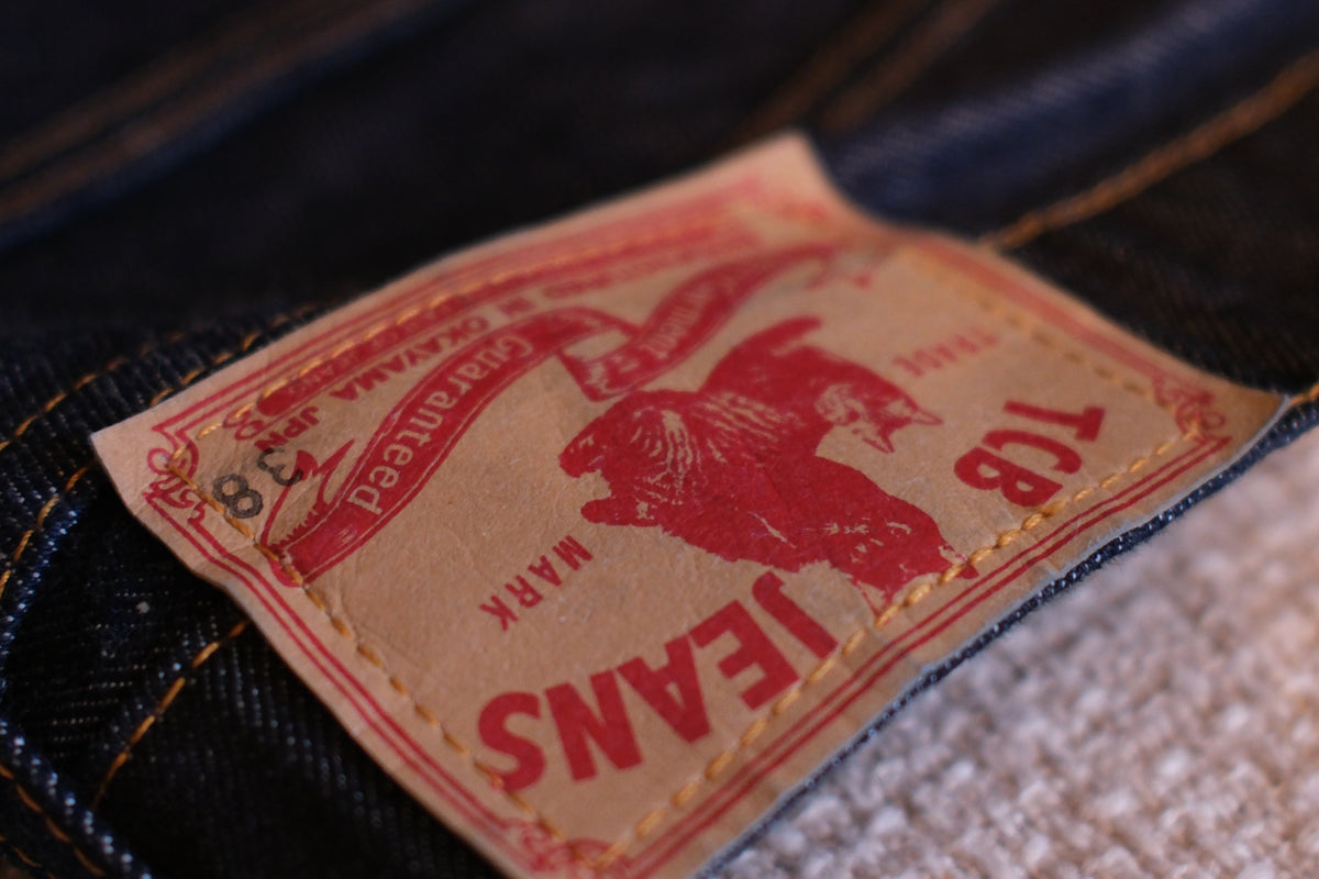Close-up of a Levi's jeans label on denim fabric.