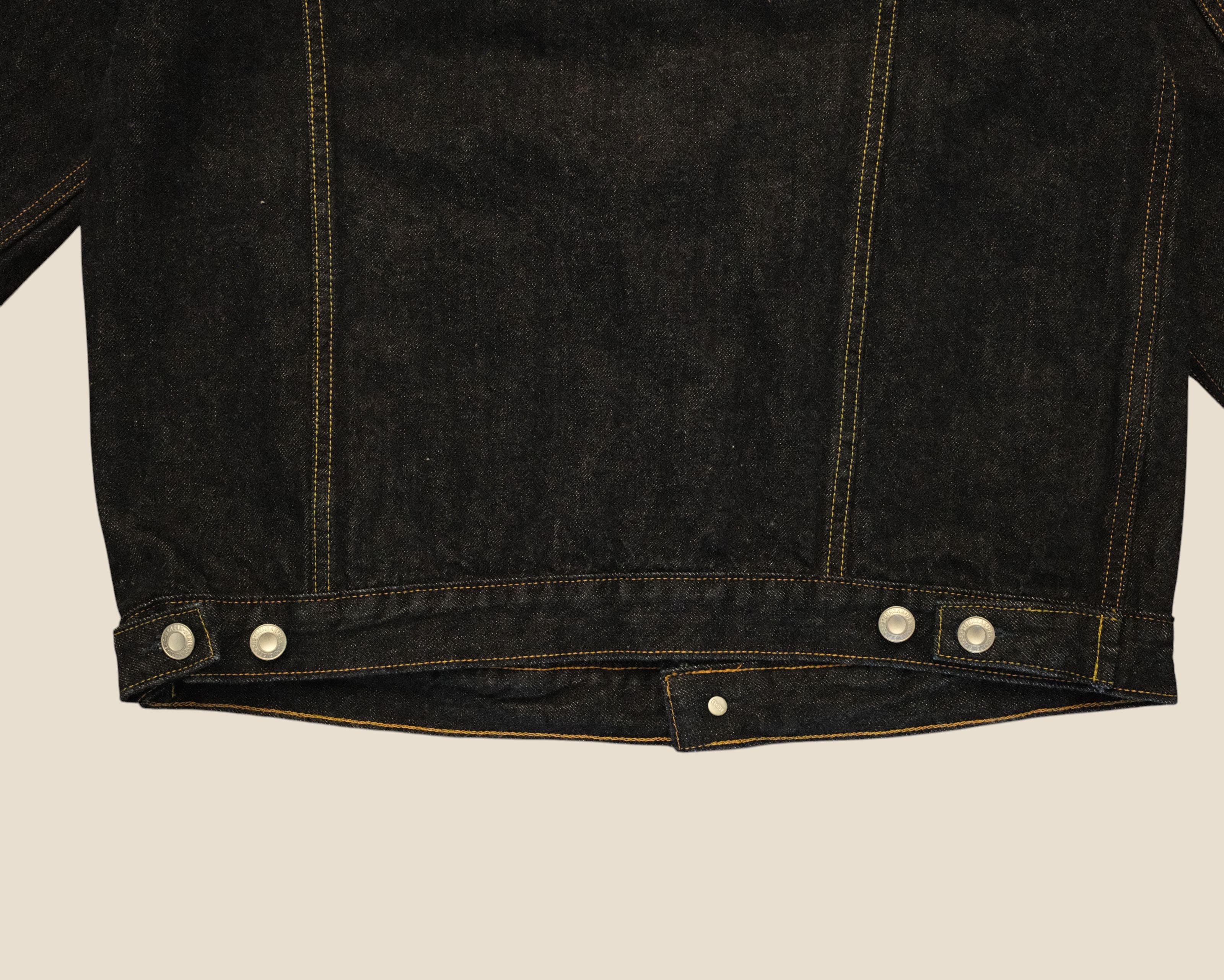 Lakefront Denim Benzak BDJ-05 dark indigo selvedge denim trucker jacket back hem with contrast stitching and buttons