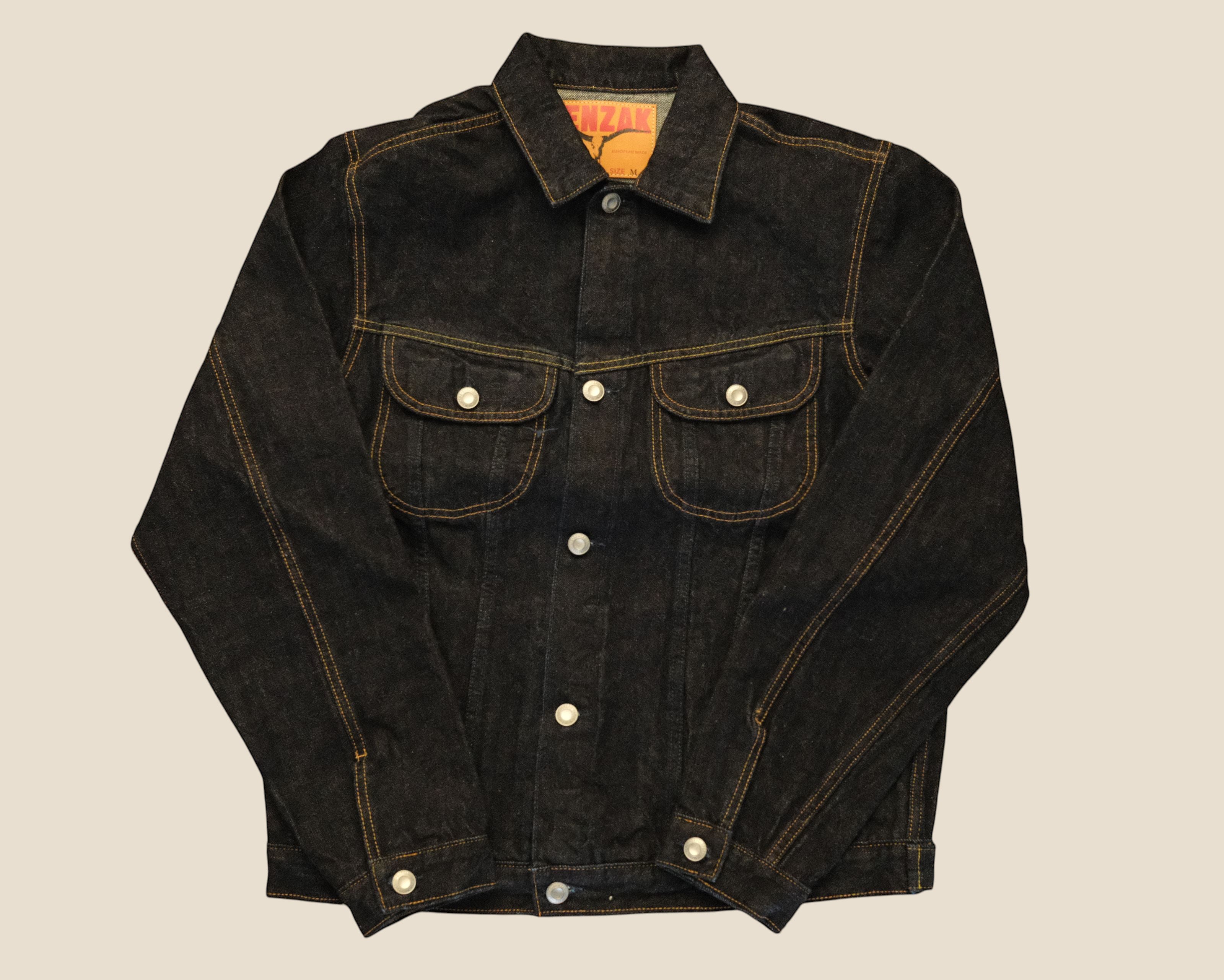 Lakefront Denim Benzak BDJ-05 dark indigo selvedge denim trucker jacket with contrast stitching and metal buttons.